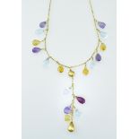 Reizendes Collier mit facettierten Steinpampeln. Amethyste, Citrine, Topase. 14 ct. GG. L 40 cm