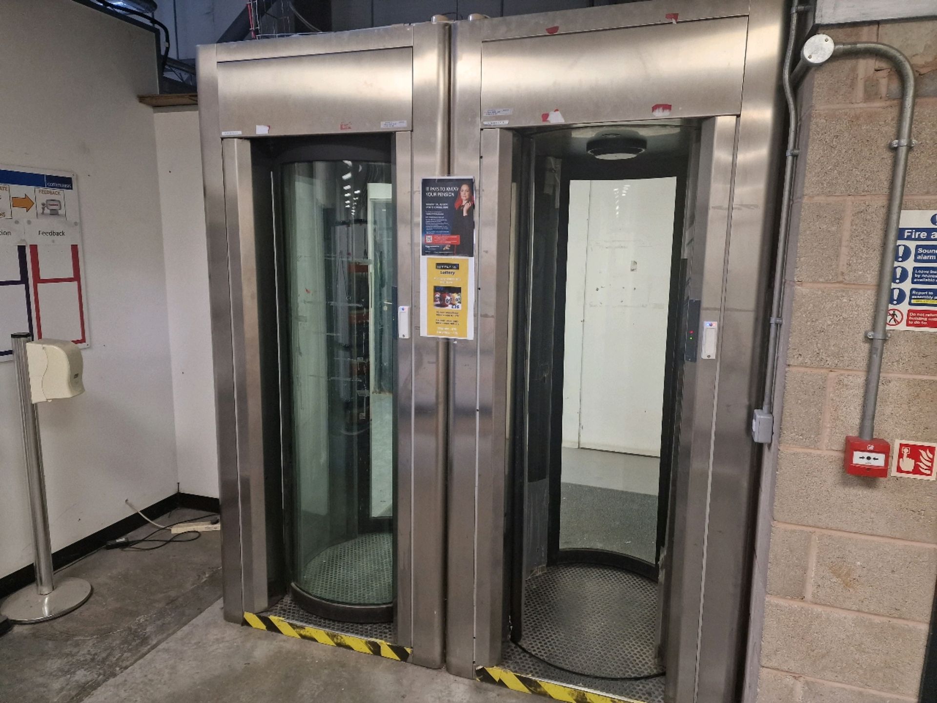 Pair Of Revolving Security Doors