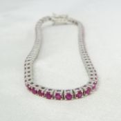3.21 carat ruby articulated line bracelet In 18ct white gold, boxed