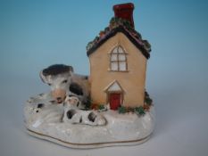 Victorian Staffordshire pottery spaniel, pup and kennel group