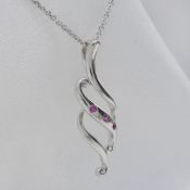 Pink tourmaline flame necklace in sterling silver