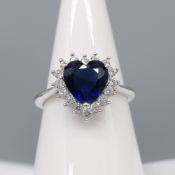 Stunning love heart dress ring set with blue and white gems, in silver