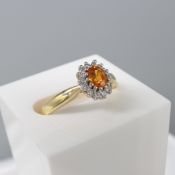Orange sapphire and diamond cluster ring, with luxury box and sleeve