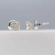 Pair of 18ct white gold solitaire ear studs set with 1.57 cts diamonds, boxed