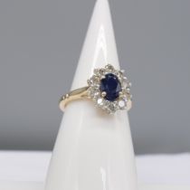 9ct yellow gold blue sapphire and brilliant-cut diamond cluster ring