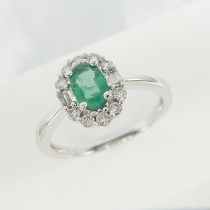 Certificated oval emerald ring with brilliant-cut and baguette-cut diamonds