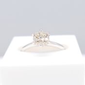 1.01 carat round brilliant-cut diamond engagement ring in white gold, certificated