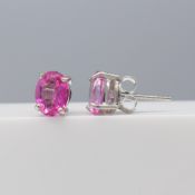 Pair of natural oval-cut pink topaz ear studs in sterling silver