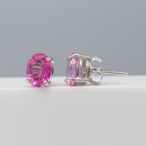 Pair of natural oval-cut pink topaz ear studs in sterling silver