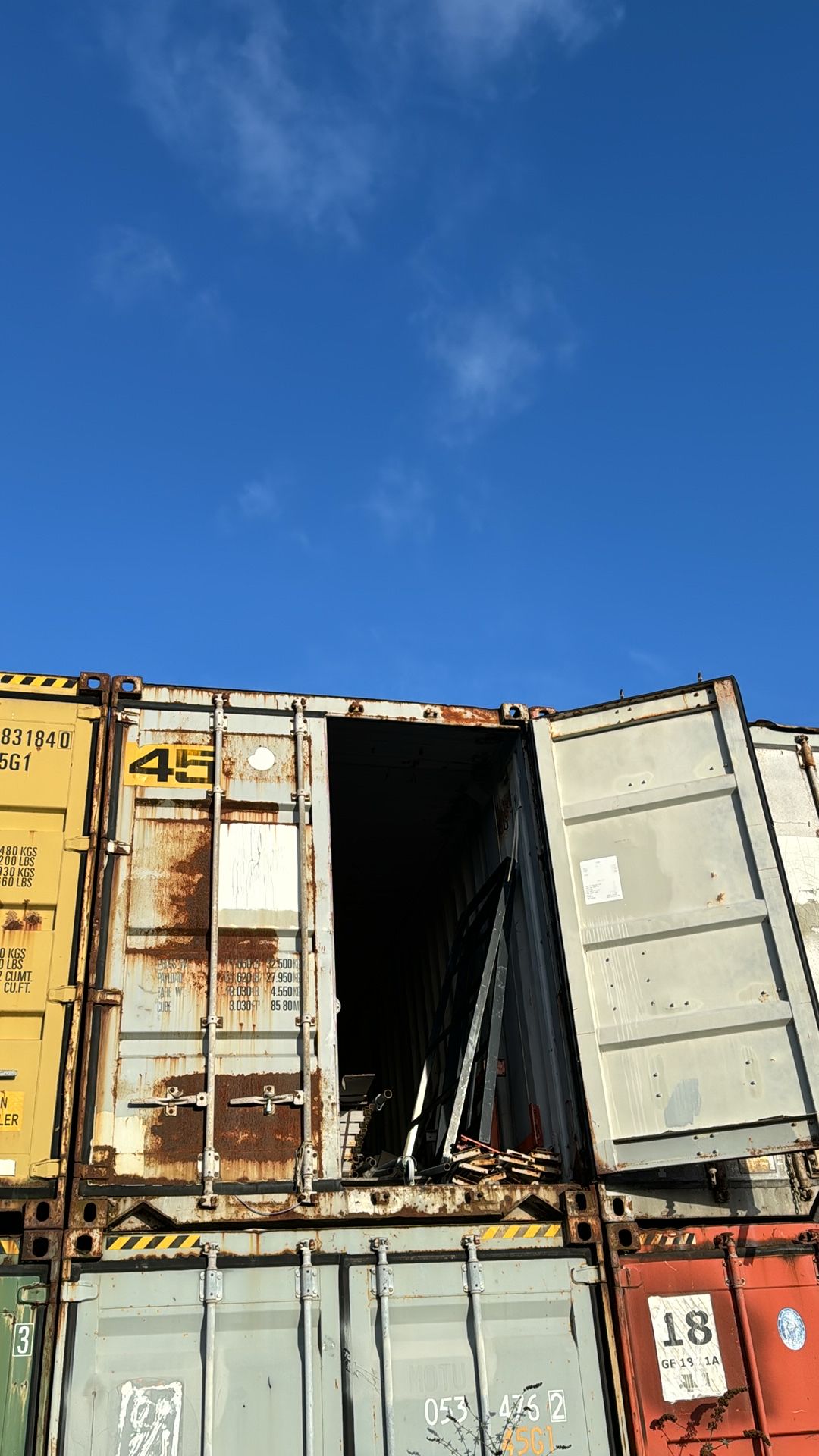 Shipping container, 46 (no ref, above container 45)