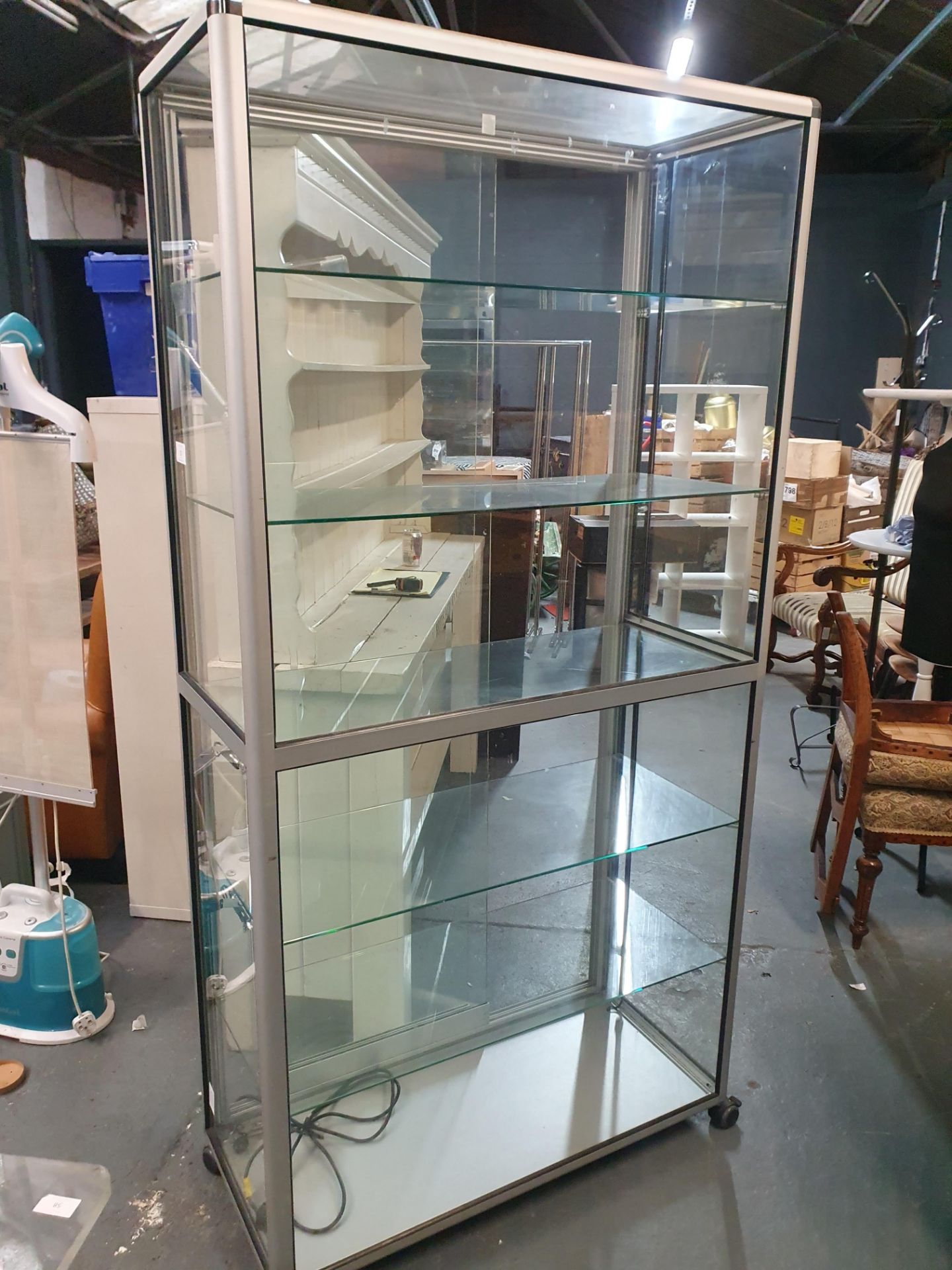 Glass Display Cabinet On Castors With Lights