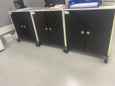 Trio Of Storage Cabinets On Wheels
