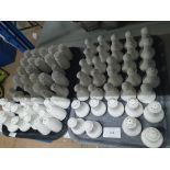 large quantity of salt and pepper shakers
