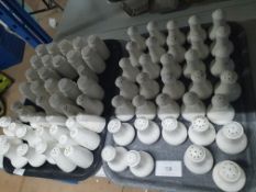 large quantity of salt and pepper shakers