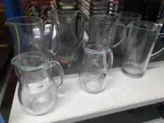 4 x glass, 3 x plastic jugs