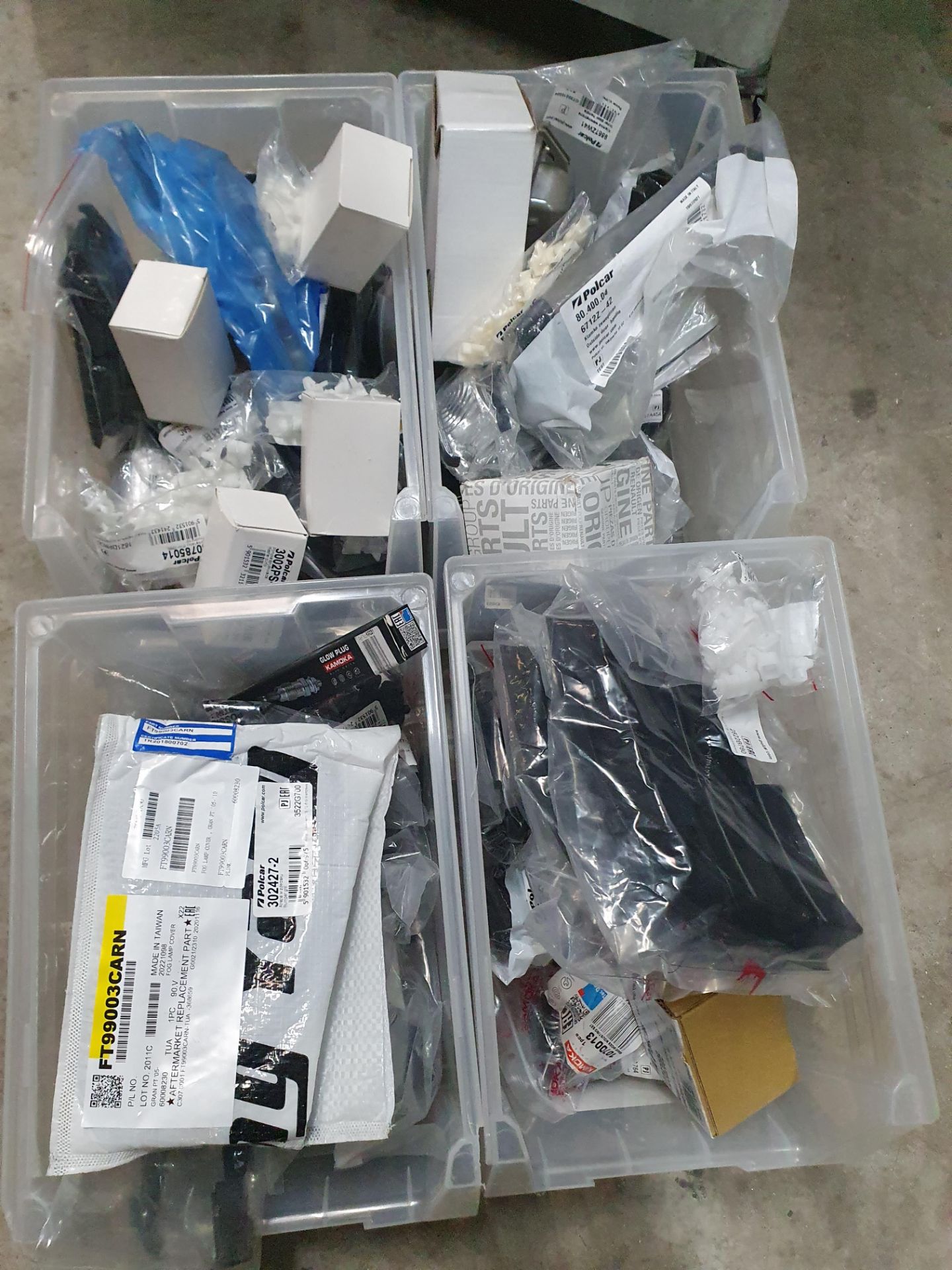 6 tubs with 70+ assorted items; glow plugs, indicators, door handles, door clips, etc