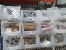 12 tubs with 100+ assorted items; glow plugs, ABS sensors, fuel caps, grills, etc