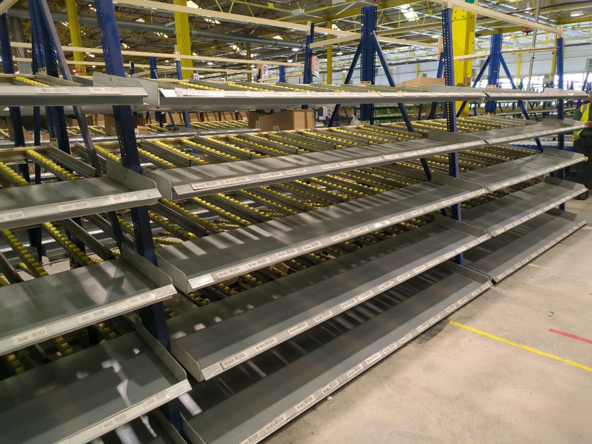 A Run Of 10 Bays Of Back To Back Flow Racks - Image 13 of 14