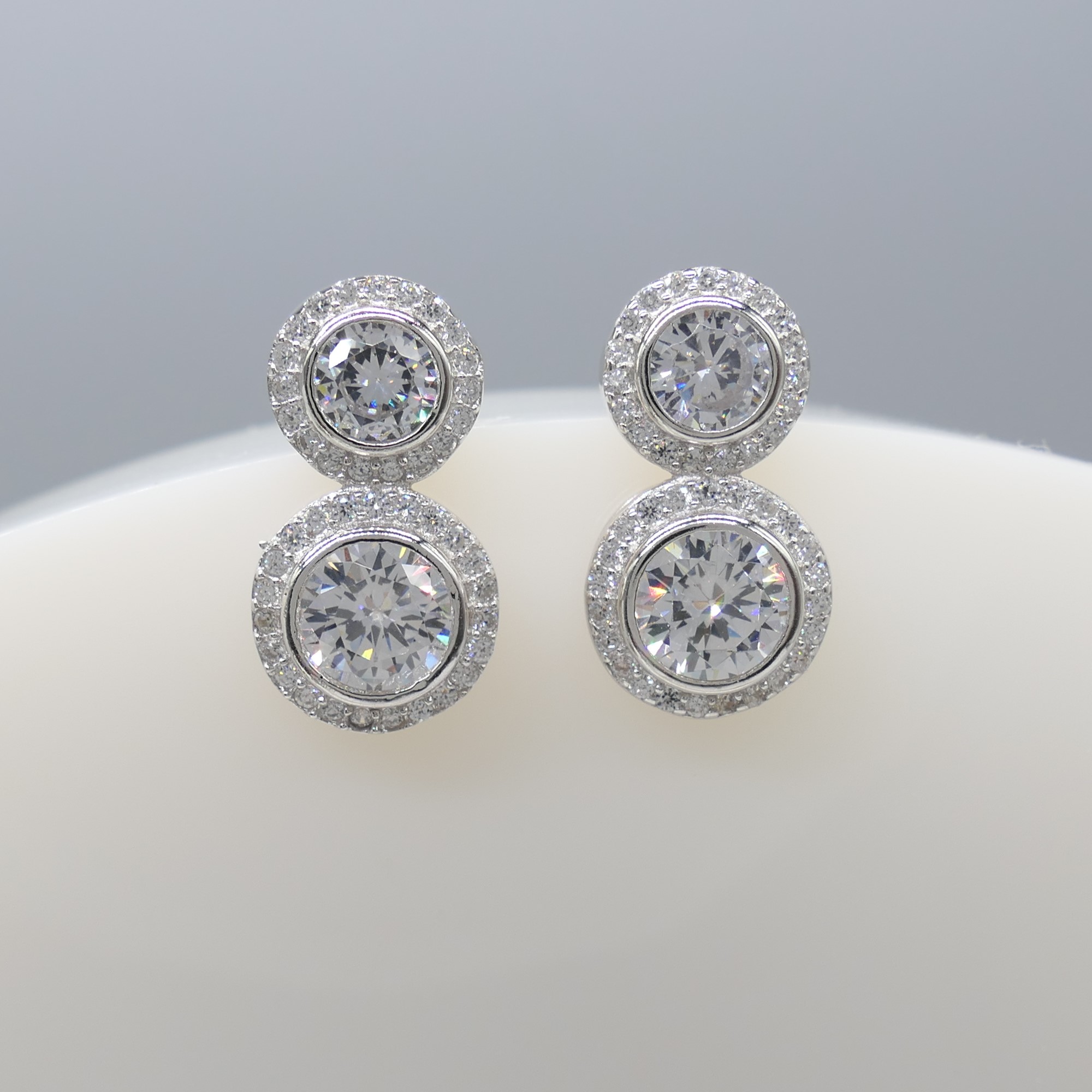 Gem-set double halo droplet earrings in silver - Image 6 of 6