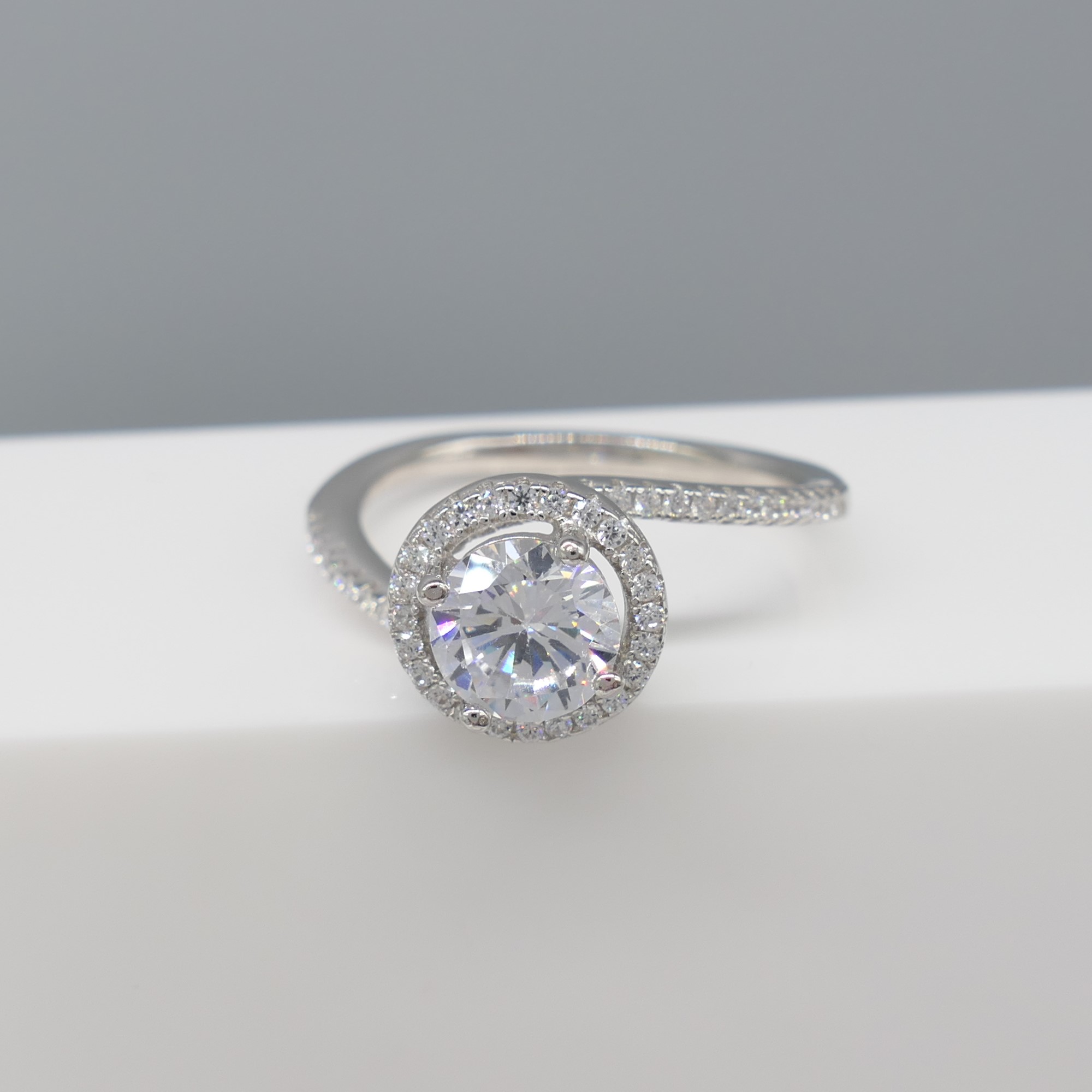 Silver cubic zirconia halo and twist dress ring - Image 3 of 6