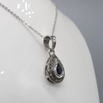 Hand-made silver necklace featuring a pear-shaped