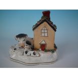 Victorian Staffordshire pottery spaniel, pup and k