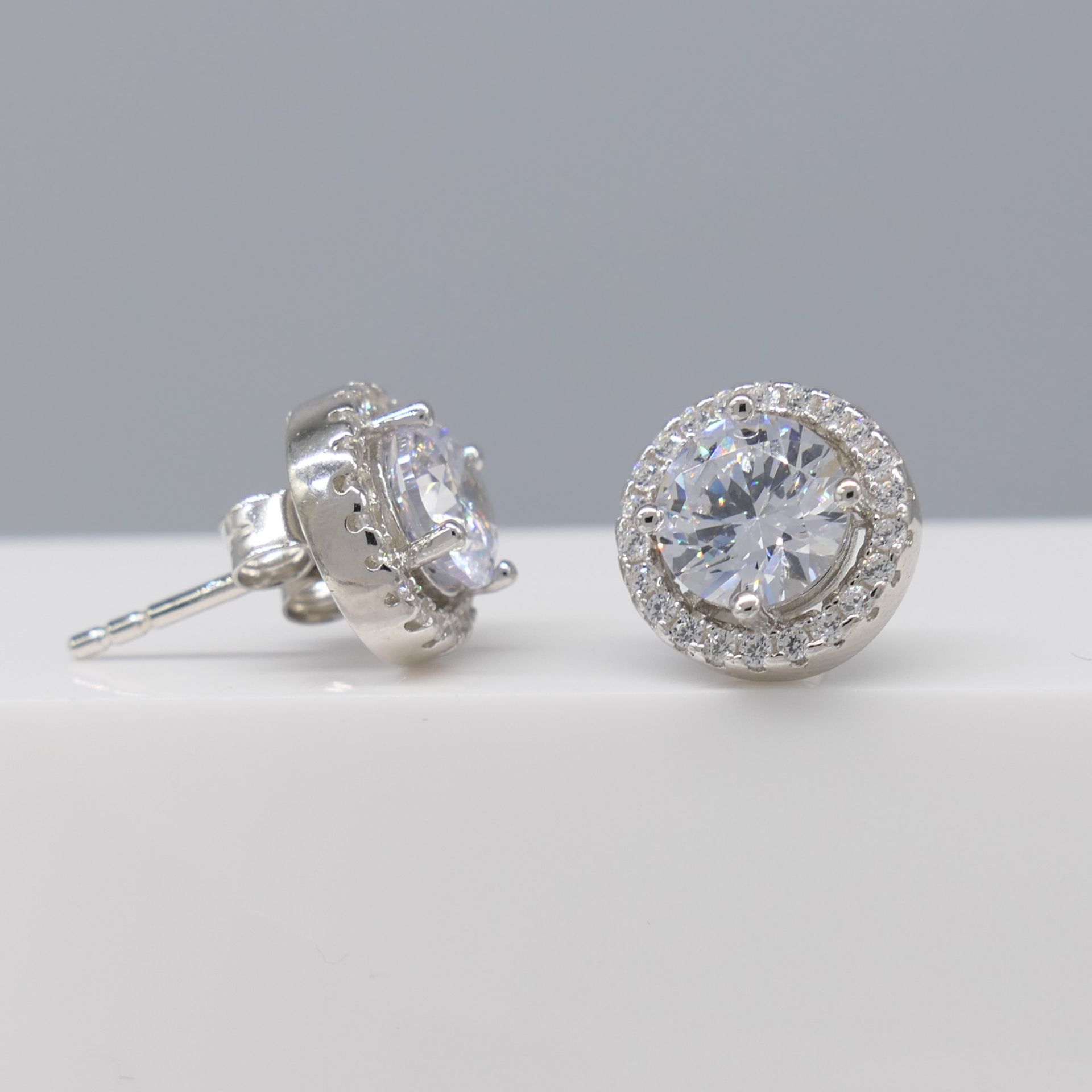 Pair of sterling silver halo stud earrings - Image 3 of 5