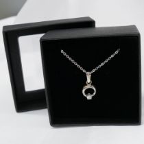 18 carat white gold and silver, cubic zirconia-set