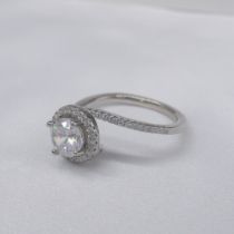 Silver cubic zirconia halo and twist dress ring