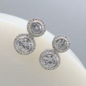 Gem-set double halo droplet earrings in silver
