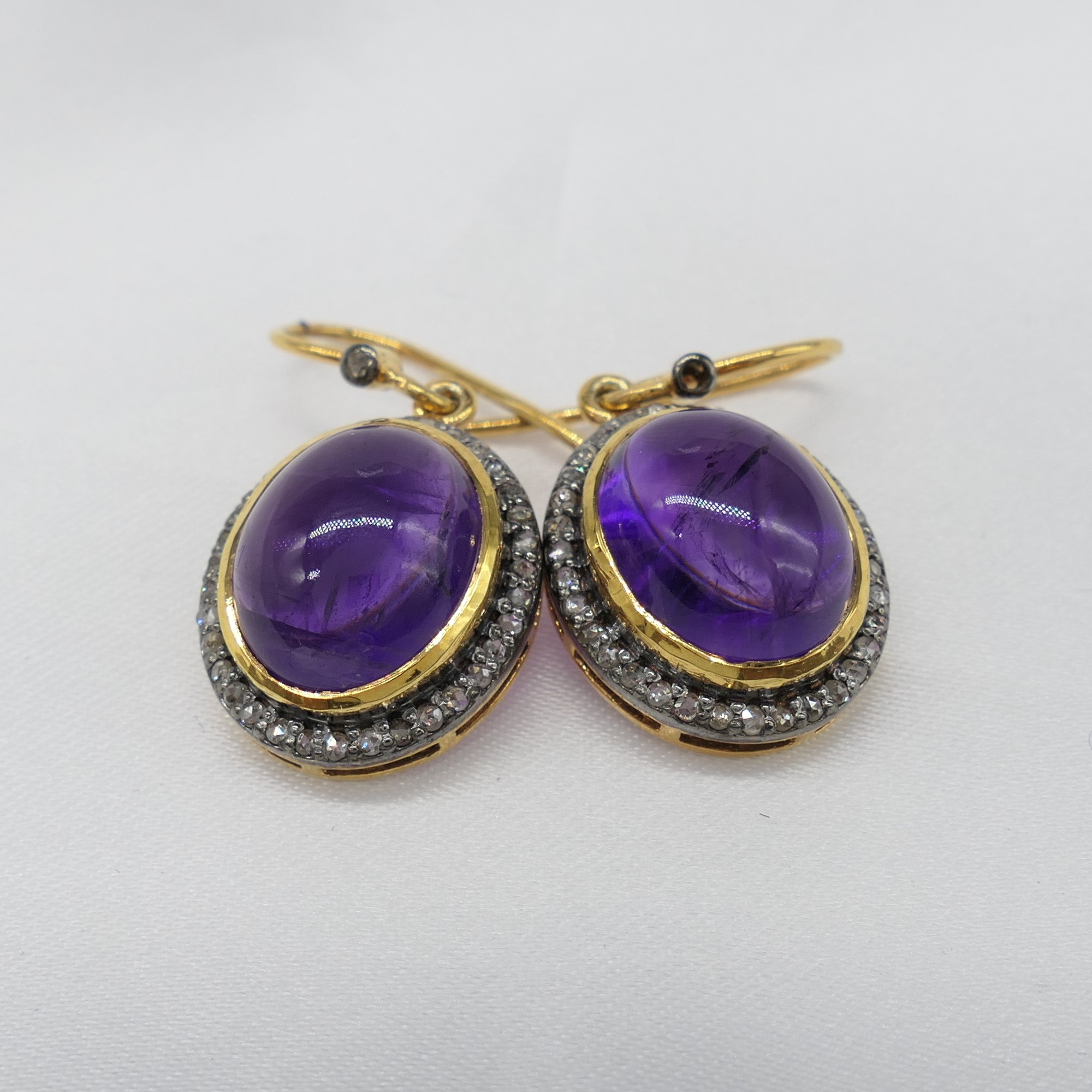 Pair of cabochon amethyst and diamond halo drop ea