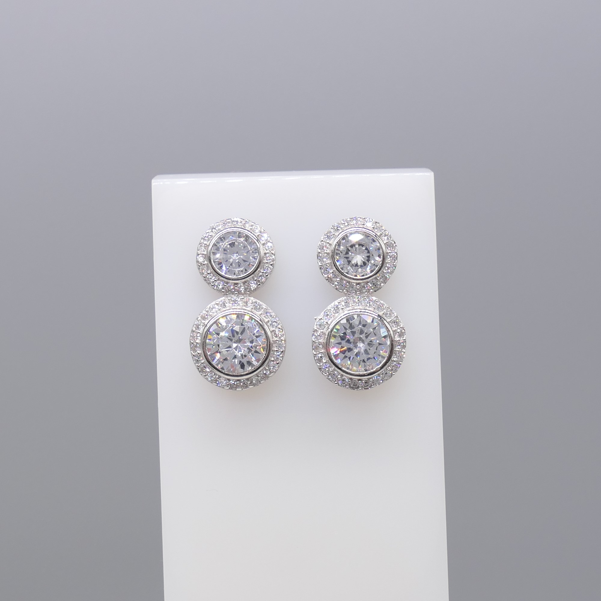 Gem-set double halo droplet earrings in silver - Image 5 of 6