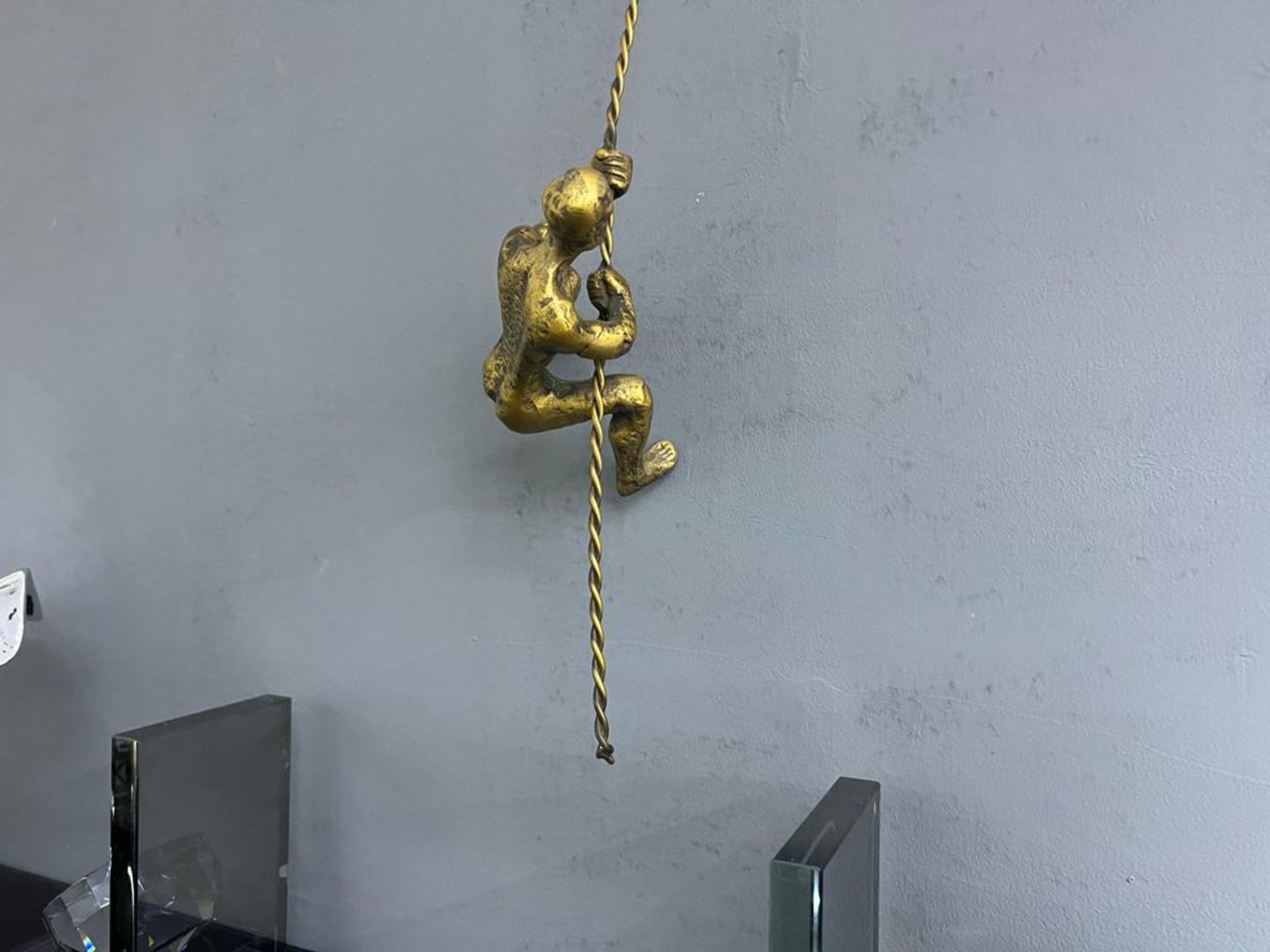 New Boxed Unique Modern Art Cast Iron Man Climbing On Rope Ornament - Gold - Image 2 of 3