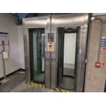 Pair Of Revolving Security Doors