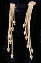 Paar 6 strängige Ohrringe, 333er Gelbgold, Länge je ca. 3,8 cm; schöner getragener Erhalt.