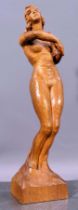 "Stehender Damenakt in bewegter Pose", ca. 35 cm hohe Holzschnitzfigur, unter dem Sockel bez.: Bern