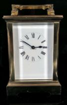 Ältere Reiseuhr, sog. "Carriage Clock", rundum verglastes Messinggehäuse, mechanisches Uhrwerk der