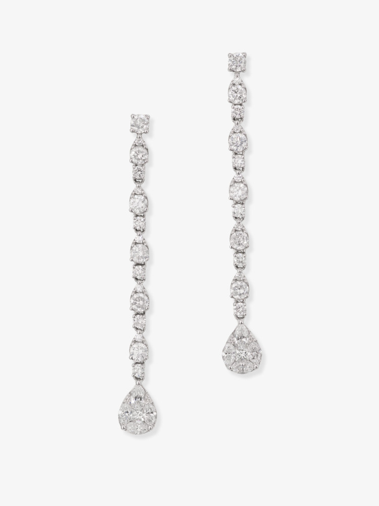 A pair of delicate, long drop earrings decorated with diamonds in different cuts - Germany