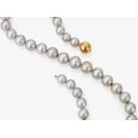 A silver-grey cultured pearl necklace