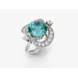 A ring with a Paraiba-coloured tourmaline and brilliant-cut diamonds