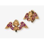 A pair of ear clips in the shape of putti with rubies - 2nd half of the 19th century