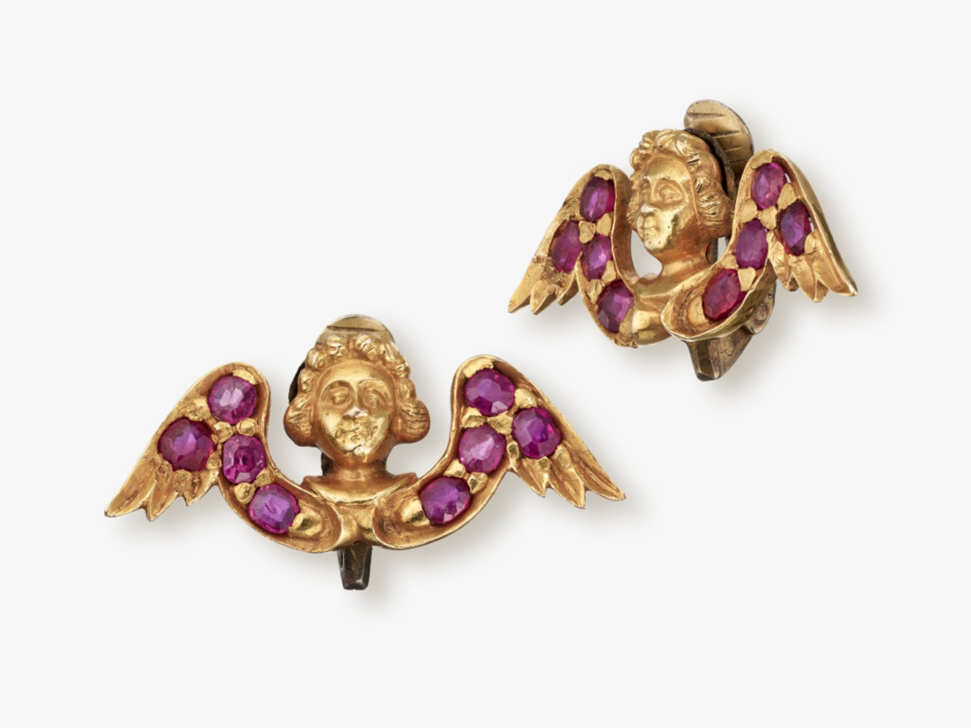 A pair of ear clips in the shape of putti with rubies - 2nd half of the 19th century