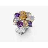 A ring with crystal opals, amethysts and brilliant-cut diamonds