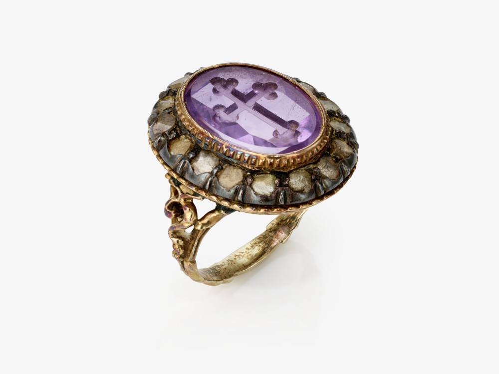 A clerical ring with an amethyst and diamond entourage - Circa 1780