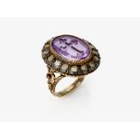 A clerical ring with an amethyst and diamond entourage - Circa 1780