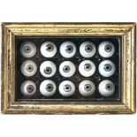 A small showcase with 15 eye prosthesis - Probably Lauscha, late 19th century / early 20th century