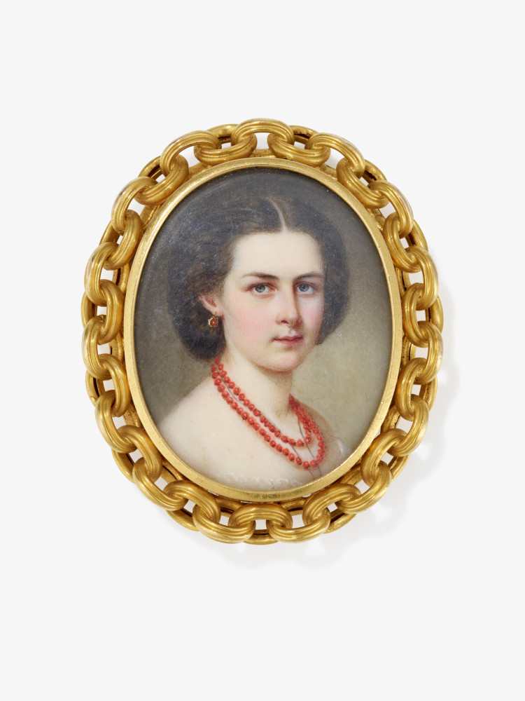 A necklace clasp with a portrait miniature of a young lady with coral jewellery - Germany, dated "Ju