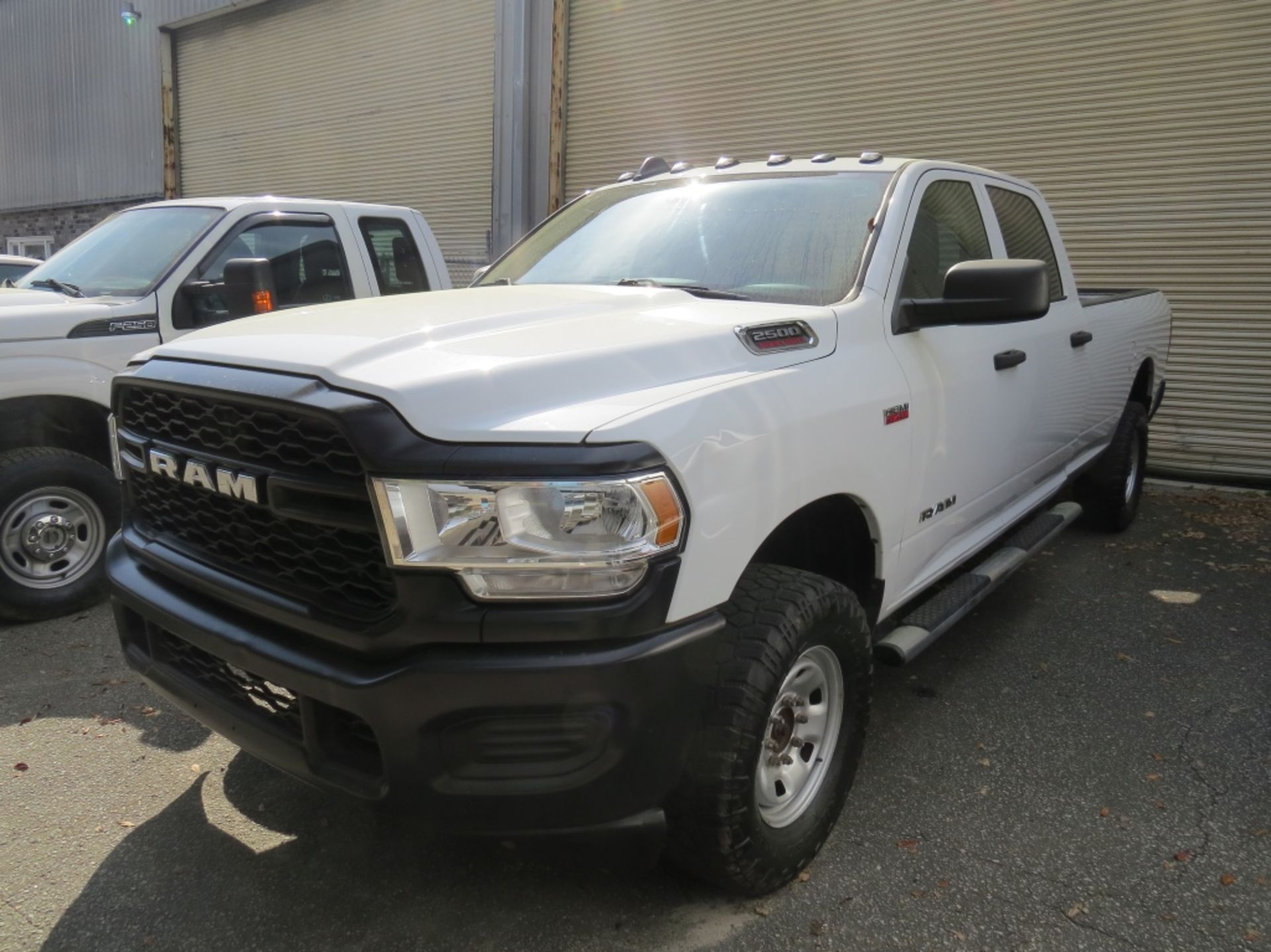 2019 Dodge Ram 2500 6.4L Hemi 4x4 VIN: 3C6UR5HJ1KG673760 63,524 miles showing 4 Door 8' Bed w/Back