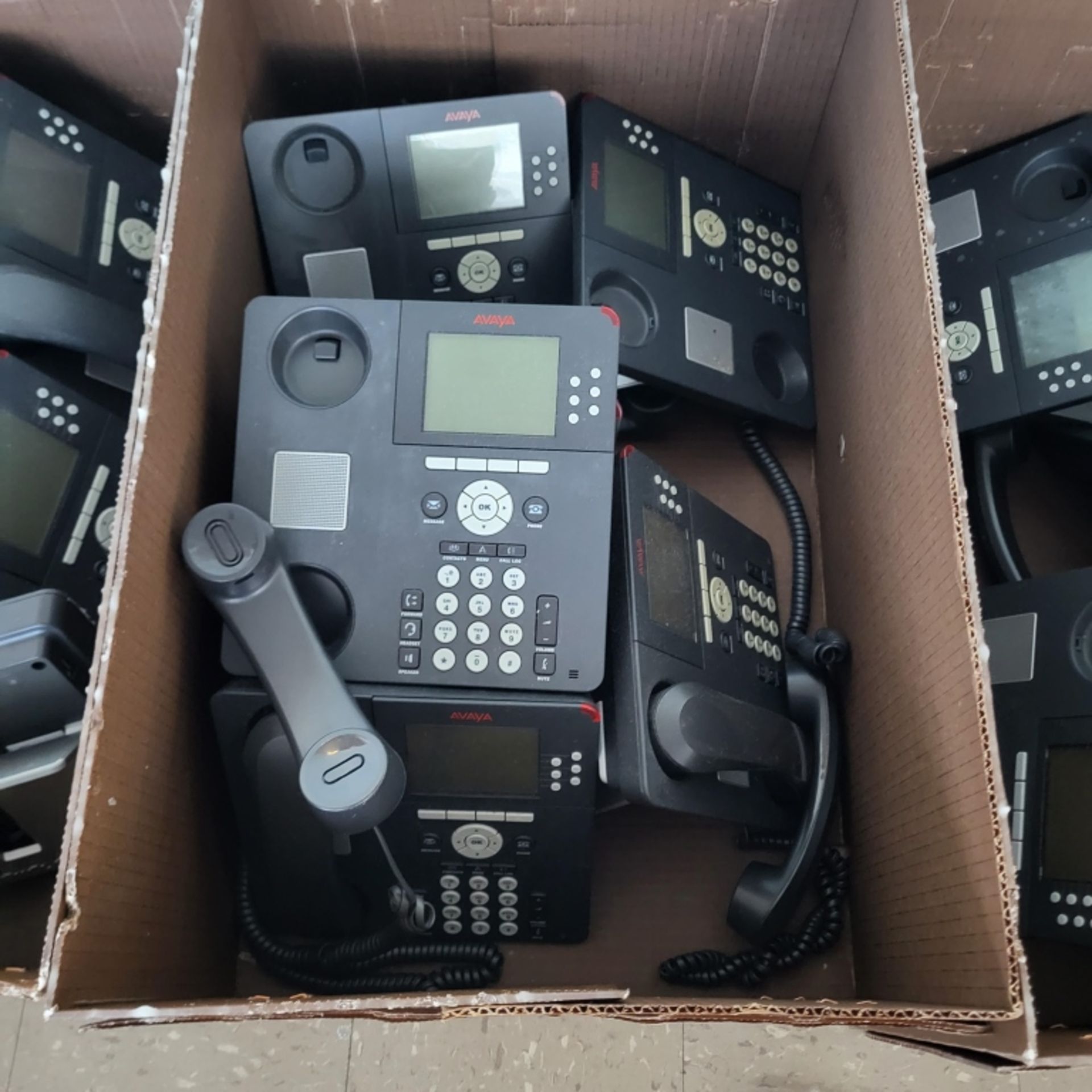 Box of avaya desk phones