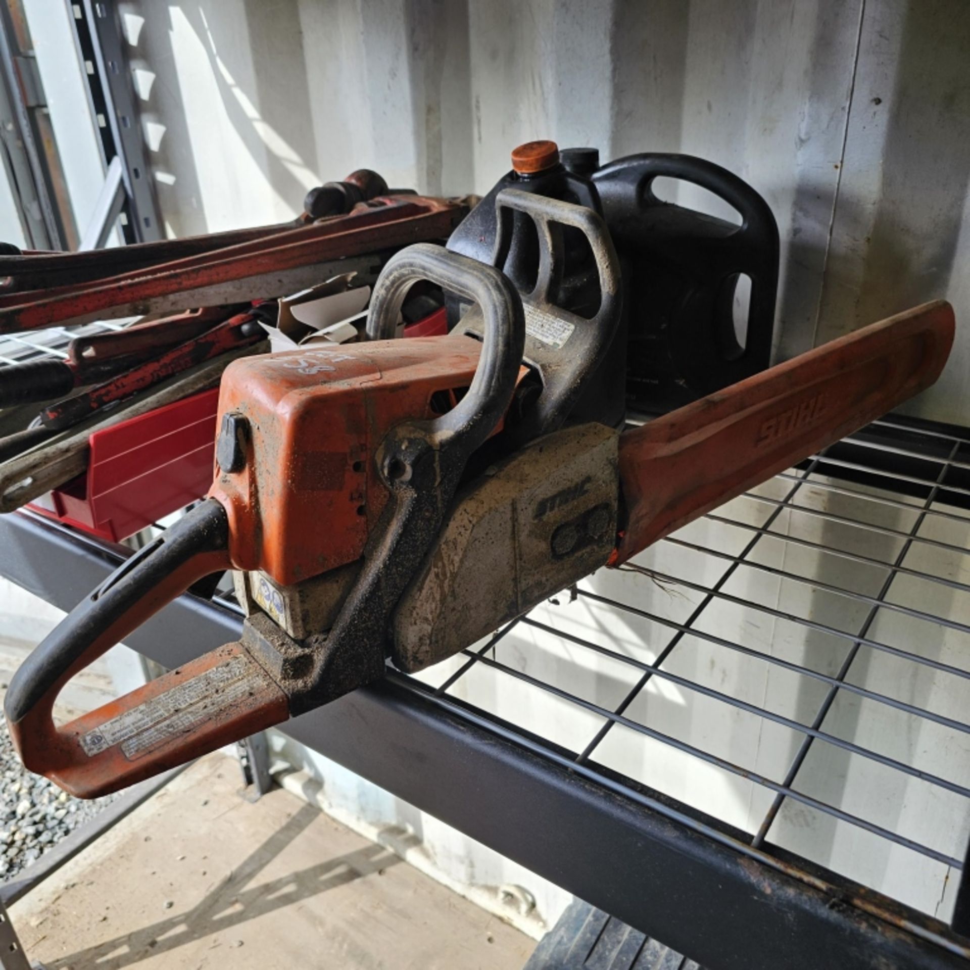 Stihl Chainsaw with extra blades and lubricant